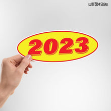 Load image into Gallery viewer, Bulk Case of 75 Sets - 2023 Car Model Year Windshield Stickers | 14" x 5.5" Oval Stickers for Car Dealerships, Vehicle Windshields (Pack of 12)