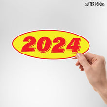 Load image into Gallery viewer, Bulk Case of 100 Sets - 2024 Car Model Year Windshield Stickers | 14" x 5.5" Oval Stickers for Car Dealerships, Vehicle Windshields (Pack of 12)