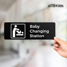 Load image into Gallery viewer, Bulk Case of 100 Sets - Baby Changing Station Sign, Durable ABS Plastic with Full Adhesive Backing, Sign for Restroom Door or Wall, 3x9"