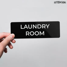 Load image into Gallery viewer, Bulk Case of 100 Signs - Laundry Room Sign 2x6", Durable ABS Plastic with Full Adhesive Backing, Sign for Door or Wall