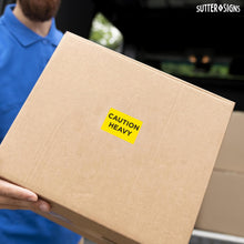 Load image into Gallery viewer, Bulk Case of 100 Rolls - 300pcs Caution Heavy Stickers, 2" x 3" Shipping Label Safety Stickers