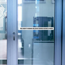 Load image into Gallery viewer, Bulk Case of 150 Signs - This Door to Remain Unlocked During Business Hours Sign | 1" High Text Adhesive Decal White Sticker 2x26 inches