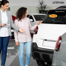 Load image into Gallery viewer, Bulk Case of 100 Sets - 2018 Car Model Year Windshield Stickers | 14" x 5.5" Oval Stickers for Car Dealerships, Vehicle Windshields (Pack of 12)