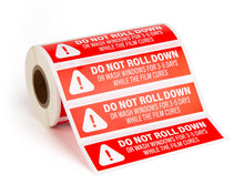 Load image into Gallery viewer, Bulk Case of 50 Rolls - 500pcs Do Not Roll Down Window Stickers, Removable Adhesive Warning Labels for Automotive Tint Shops, Vinyl Wrapping, 1&quot; x 4&quot;
