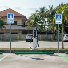 Load image into Gallery viewer, Bulk Case of 50 Sets - Accessible Electric Vehicle Charging Sign, Aluminum EV Parking Use Last Sign, 12" x 18"