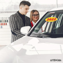 Load image into Gallery viewer, Bulk Case of 63 Sets - 2022 Car Model Year Windshield Stickers | 14" x 5.5" Oval Stickers for Car Dealerships, Vehicle Windshields (Pack of 12)