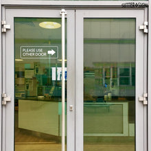Load image into Gallery viewer, Bulk Case of 200 Sets - Please Use Other Door Stickers, Left and Right Arrow Decals, 12" x 4" Transparent  Stickers (Pack of 4)