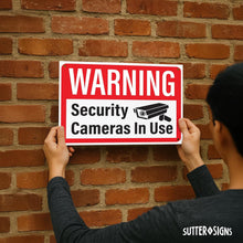 Load image into Gallery viewer, Bulk Case of 63 Sets - Security Cameras in Use Sign, Plastic Video Surveillance Warning Signs, 10" x 14" with Mounting Holes (Pack of 4)